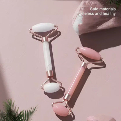 Facial massage roller for skincare in white and pink, showcasing safe materials for an enhanced beauty routine.